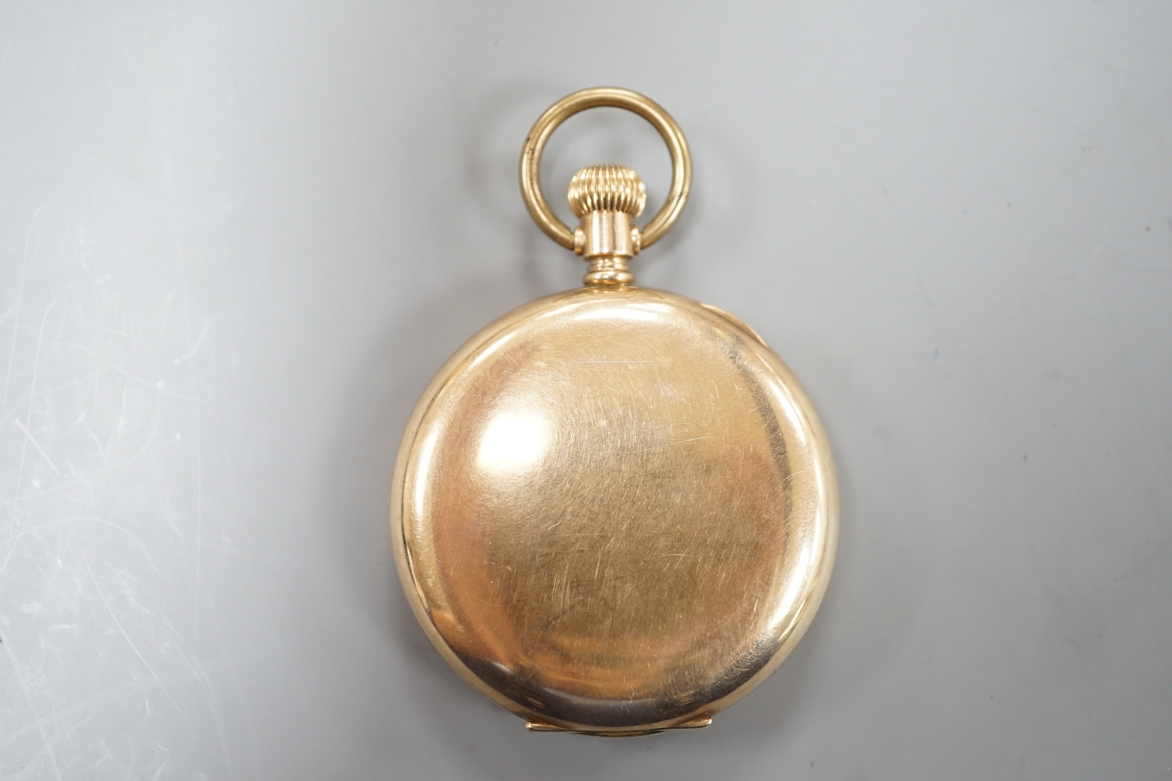 An Elgin gold plated hunter keyless pocket watch, with Roman dial and subsidiary seconds, the case with engraved monogram.